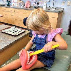 Winning Smiles - Amherst - Having fun while waiting for the dr to come in