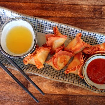 Odd Couple - a plate of vegetable spring rolls with dipping sauce and chopsticks - Asian Fusion Near Me - Saskatoon, Saskatchewan Odd Couple - a plate of vegetable spring rolls with dipping sauce and chopsticks - Asian Fusion Near Me - Saskatoon, Saskatchewan