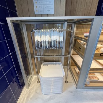 Paris Baguette - Trays, wax paper and tongs station - Bakeries Near Me - Winter Garden, Florida Paris Baguette - Trays, wax paper and tongs station - Bakeries Near Me - Winter Garden, Florida