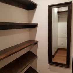 Albright Property Services - Custom walk in closet with shoe shelves