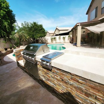 Fresh Look Landscaping - an outdoor kitchen and pool - Landscaping Near Me Fresh Look Landscaping - an outdoor kitchen and pool - Landscaping Near Me