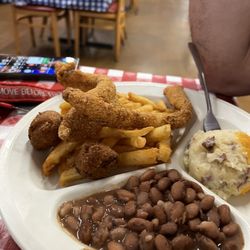 Farm House - Catfish (2) with mashed potatoes and pinto beans.