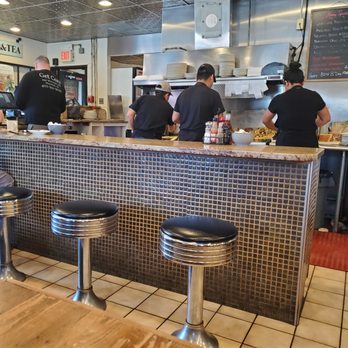 The Cozy Grill - Watching breakfast get cooked. - Breakfast & Brunch Near Me - Warwick, Rhode Island The Cozy Grill - Watching breakfast get cooked. - Breakfast & Brunch Near Me - Warwick, Rhode Island
