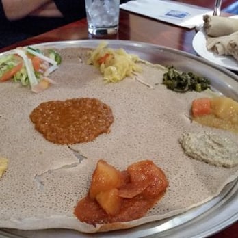 Blue Fern Travel - Ethiopian food at Etete - Food Tours Near Me - Washington, DC, District of Columbia Blue Fern Travel - Ethiopian food at Etete - Food Tours Near Me - Washington, DC, District of Columbia