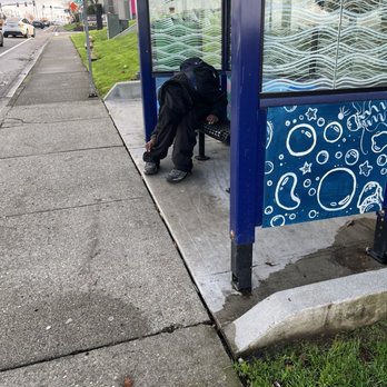 T-Mobile Experience Store - Drug addict outside of t mobile, city of Bellevue needs to do better - Mobile Phones Near Me - Redmond, Washington