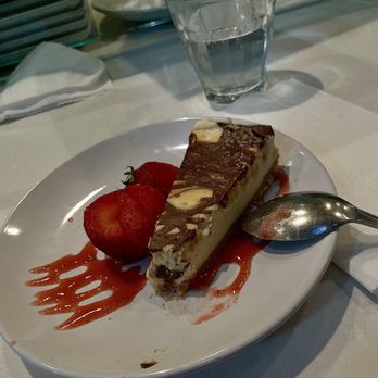 Holbox - Chocolate Swirl Cheesecake: absolutely delicious! It's not overwhelmingly sweet and the strawberries complement it well. - Latin American Near Me - Los Angeles, California Holbox - Chocolate Swirl Cheesecake: absolutely delicious! It's not overwhelmingly sweet and the strawberries complement it well. - Latin American Near Me - Los Angeles, California