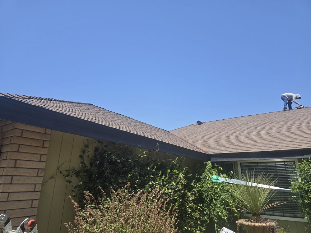 Slide of Revival Roofing