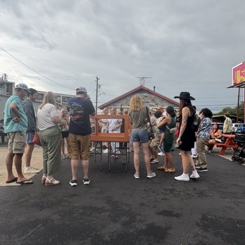 The Little Longhorn Saloon - Everyone gathering around to see the chicken. - Dive Bars Near Me - Austin, Texas