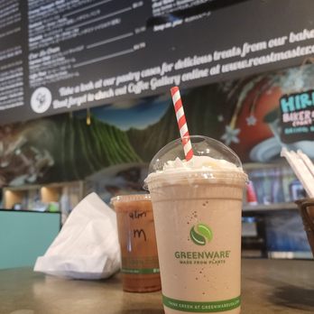 Coffee Gallery - Mocha Freeze, Ice mocha latte almond milk, and bag containing a freshly toasted Mocha brownie and  (okimawan) sweet potato muffin - Coffee & Tea Near Me - Haleiwa, Hawaii