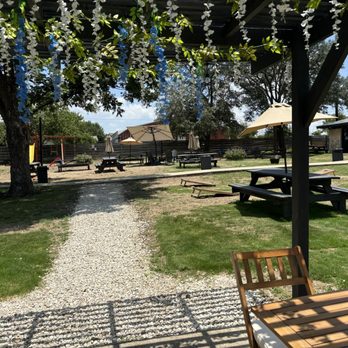 Refuge Coffee and Beer - Beautiful gazebo with peek through for playground set and ample seating - Coffee & Tea Near Me - San Antonio, Texas