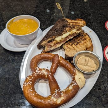 KC Bier - Reuben Sammie with pretzel and beer cheese soup - Bars Near Me - Lenexa, Kansas KC Bier - Reuben Sammie with pretzel and beer cheese soup - Bars Near Me - Lenexa, Kansas