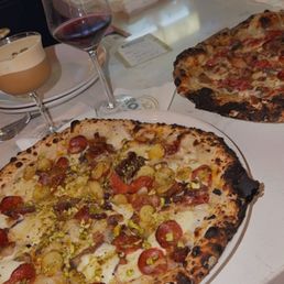First time here & wont be the last. BEST espresso martini and pizza in Baton Rouge. We sat at the bar and they were very attentive.