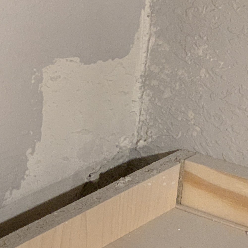 Drees Custom Homes Office and Design Center - Left the walls like this, noticed when I climbed on a ladder to check the tile - Home Developers Near Me - Austin, Texas