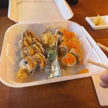 Sushi Sakana - a person eating sushi in a styrofoam container - Sushi Bars Near Me - Port Royal, South Carolina Sushi Sakana - a person eating sushi in a styrofoam container - Sushi Bars Near Me - Port Royal, South Carolina