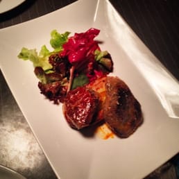 Vennison with bacon wrapped potatoes.