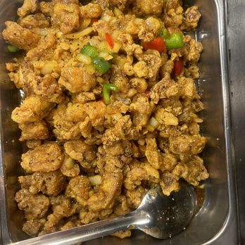 QQ Express - a bowl of food with a spoon in it - Chinese Near Me - Madison, Wisconsin