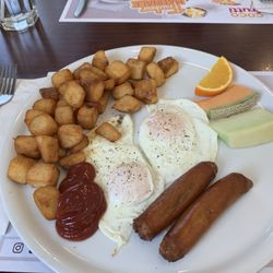 Coco Frutti - Eggs, sausage, fruit, potatoes and sausage YUM
