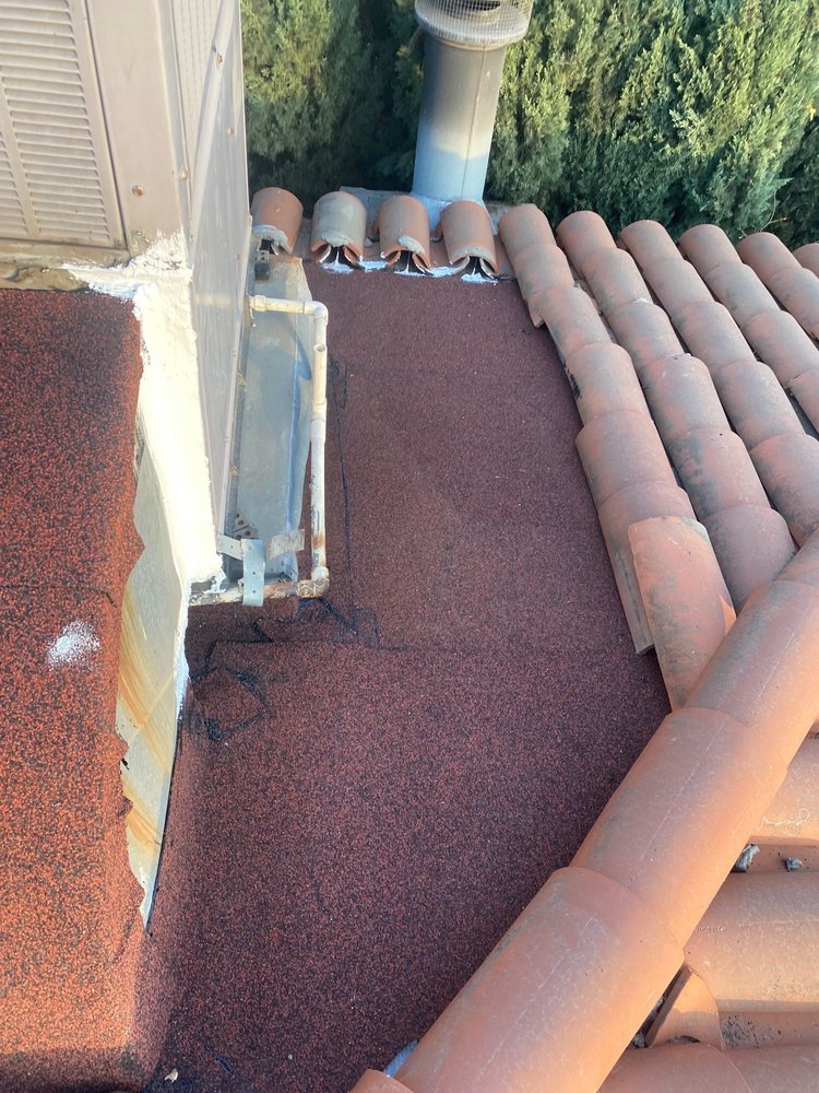 Slide of Rain Tec Roofing
