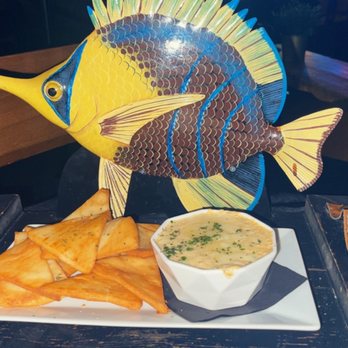 Deluxe Fun Dining - The crab dip at the table. - Bars Near Me - Charlotte, North Carolina Deluxe Fun Dining - The crab dip at the table. - Bars Near Me - Charlotte, North Carolina