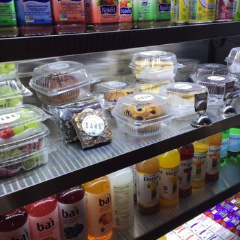Merge Cafe - Quantico - The refrigerated section has a nice selection of juices, water, tea, fruit, and baked goods. - Coffee & Tea Near Me - Quantico, Virginia