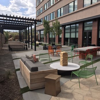 Origin Hotel Red Rocks - Really cool outdoor patio right when you walk in - Hotels Near Me - Golden, Colorado Origin Hotel Red Rocks - Really cool outdoor patio right when you walk in - Hotels Near Me - Golden, Colorado
