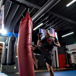 Cutting Edge Martial Arts Academy - One of our instructors, Mr. Crosby, demonstrating a knee strike that we use in Muay Thai.