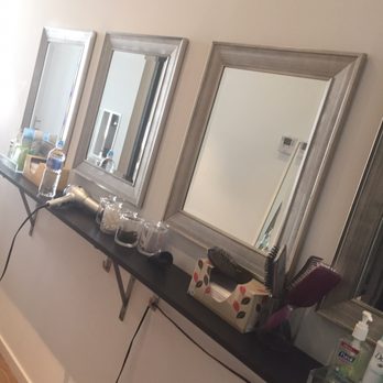 Y7 Studio - vanity near the bathroom with scrunchies, blow dryers, bobby pins, tissues & (used) brushes. - Yoga Near Me - New York, New York