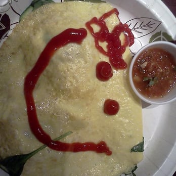 Eggs 'n Things - Smiling Veggie Omelette with Hibiscus Ketchup that I drew on it :) Very Delicious- as you can see too, the omelettes are huge! - Breakfast & Brunch Near Me - Honolulu, Hawaii