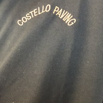Costello paving - a close up of the back of a black jacket - General Contractors Near Me