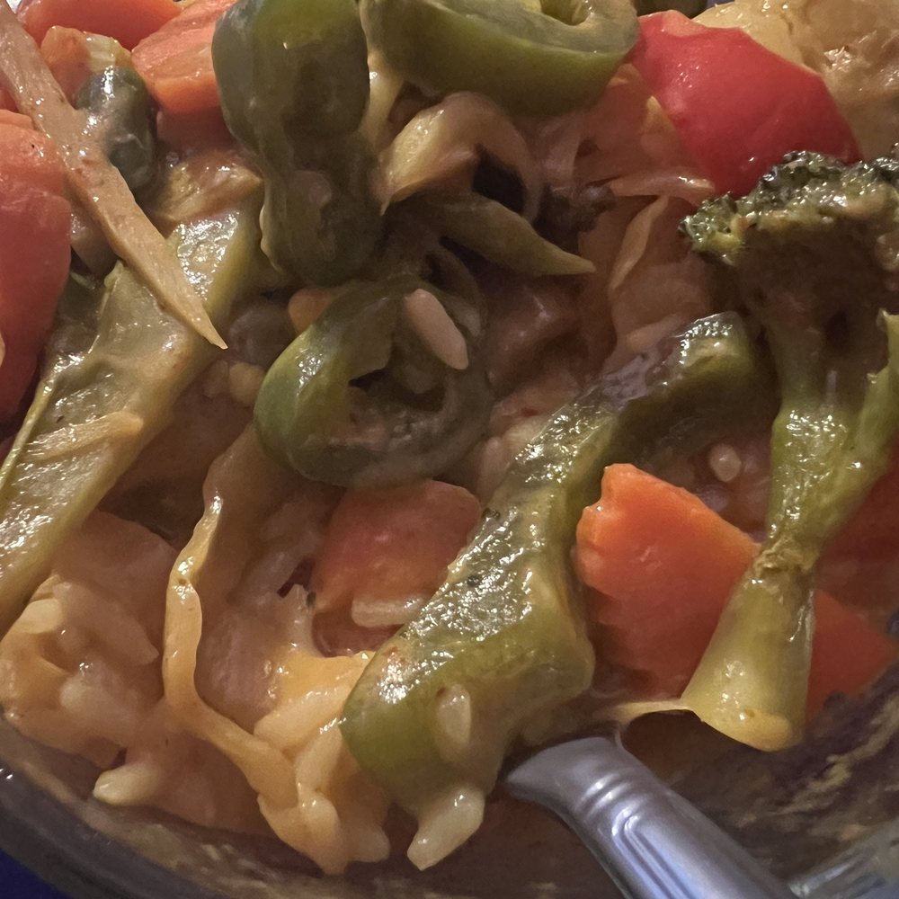 Yellow curry had frozen peas, corn & carrots in it (that was a first for me) and jalapeños for the spice cooked in it. Who is cooking this? Yellow curry had frozen peas, corn & carrots in it (that was a first for me) and jalapeños for the spice cooked in it. Who is cooking this?