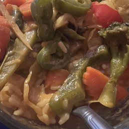 Yellow curry had frozen peas, corn & carrots in it (that was a first for me) and jalapeños for the spice cooked in it. Who is cooking this? Yellow curry had frozen peas, corn & carrots in it (that was a first for me) and jalapeños for the spice cooked in it. Who is cooking this?