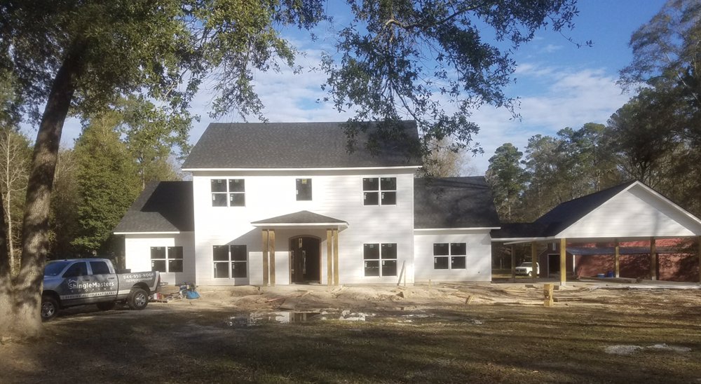 Slide of ShingleMasters Roofing