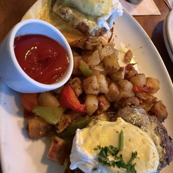 Land Ocean Restaurant Folsom - Land Ocean Benedict - One filet mignon benedict and one LO crab cake benedict with country potatoes - Steakhouses Near Me - Folsom, California