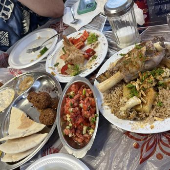 Petra Middle Eastern Cuisine - Appetizer sampler..Maglooba with lamb...Fatoush Salad....Arabian Salad - Middle Eastern Near Me - Mishawaka, Indiana Petra Middle Eastern Cuisine - Appetizer sampler..Maglooba with lamb...Fatoush Salad....Arabian Salad - Middle Eastern Near Me - Mishawaka, Indiana
