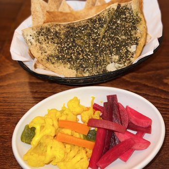 Tanoreen - Complimentary pickles and za'atar pita bread - Middle Eastern Near Me - Brooklyn, New York Tanoreen - Complimentary pickles and za'atar pita bread - Middle Eastern Near Me - Brooklyn, New York
