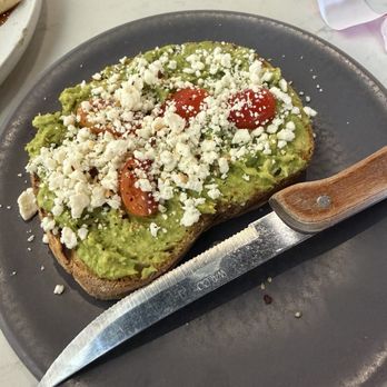Sweet Notes Cafe - Avocado Toast with feta and tomatoes - Coffee & Tea Near Me - Kent, Washington Sweet Notes Cafe - Avocado Toast with feta and tomatoes - Coffee & Tea Near Me - Kent, Washington