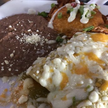 Camino Real Kitchen & Tequila - My Spicy Suizas Enchilada with 2 Sides beans and pancake potatoes 9/10 delicious!!!  05/07/22 - Mexican Near Me - Bakersfield, California