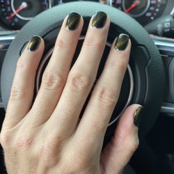 Darling Nails And Spa - Halloween vibes. Gel color #97 over black & cat eyes effect. 10/7/2022