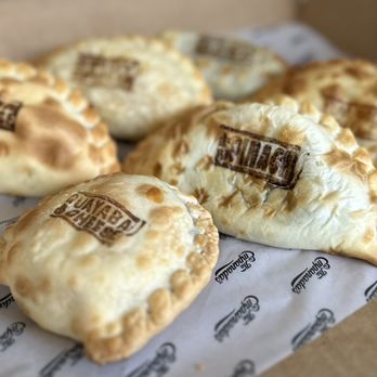 The Empanada's - four empanadas in a box - Empanadas Near Me - Miami, Florida The Empanada's - four empanadas in a box - Empanadas Near Me - Miami, Florida