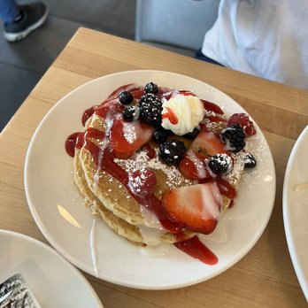 Eggsquisite Cafe - Mixed berry pancakes: Pancakes with Robitussin tasting syrup - Breakfast & Brunch Near Me - Southlake, Texas