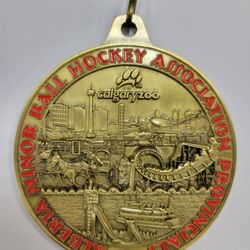 Redmond Trophy & Engraving - See us for your large quantity of custom  medals or golf bag tags.