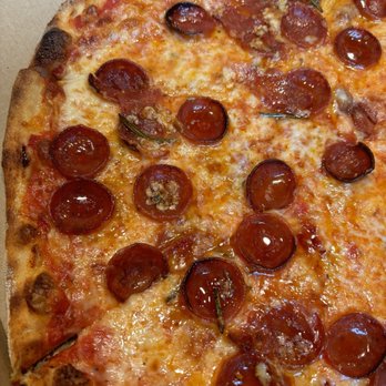 Corner Pizza - KILLER BEE half (red sauce, mozzarella, pepperoni, soppressata, gorgonzola, rosemary, and hot honey) of a 50/50 pizza - Pizza Near Me - Oceanside, California