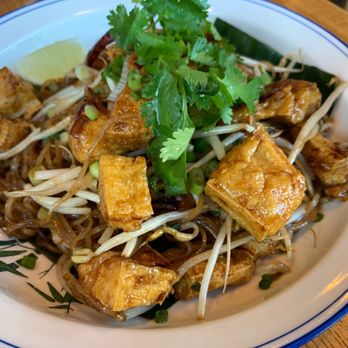 Thip Khao - Kua Mee - wok noodles, fish sauce caramel, egg, bean sprout, scallion, lime with fried tofu - Laotian Near Me - Washington, DC, District of Columbia Thip Khao - Kua Mee - wok noodles, fish sauce caramel, egg, bean sprout, scallion, lime with fried tofu - Laotian Near Me - Washington, DC, District of Columbia