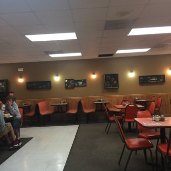 Arni's - Monticello - a man sitting at a table - Pizza Near Me - Monticello, Indiana
