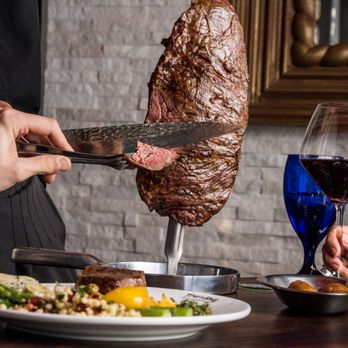 Texas de Brazil - Omaha - Enjoy continuous servings of meat, carved table-side by the restaurant gauchos. - Steakhouses Near Me - Omaha, Nebraska Texas de Brazil - Omaha - Enjoy continuous servings of meat, carved table-side by the restaurant gauchos. - Steakhouses Near Me - Omaha, Nebraska