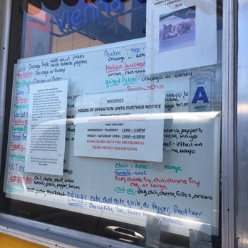 Woofies - a sign in a window of a restaurant - Hot Dogs Near Me - Overland, Missouri Woofies - a sign in a window of a restaurant - Hot Dogs Near Me - Overland, Missouri