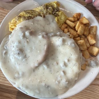 The Big Biscuit - The Mayberry. It's essentially an omelette covered with a biscuit and gravy and potatoes on the side. - Breakfast & Brunch Near Me - Wichita, Kansas The Big Biscuit - The Mayberry. It's essentially an omelette covered with a biscuit and gravy and potatoes on the side. - Breakfast & Brunch Near Me - Wichita, Kansas