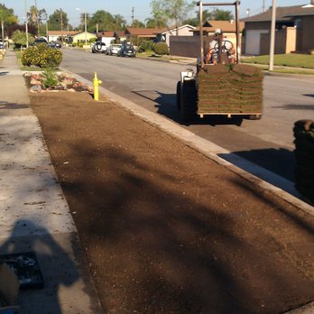 Rojas Gardening Services - a man working on a driveway - Landscaping Near Me Rojas Gardening Services - a man working on a driveway - Landscaping Near Me