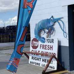 Erickson & Jensen Seafood - Look for the sign outside. Get the ticket downstairs next to the sign, and pay upstairs please. Enjoy! Shrimp
