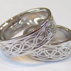 Montanari Fine Art Jewelers - Hand-made matching wedding bands in 14-karat white gold